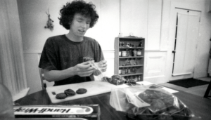 Old photo of a young Jeff Jones bagging up cannabis cookies.