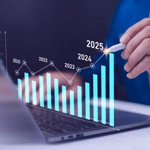 Graph with increasing height overlayed image of someone using computer