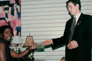 In 1998, the Oakland Cannabis Buyer’s Cooperative was briefly allowed to legally provide cannabis to patients by the 9th Circuit Court of Appeals before the US Supreme Court reversed the decision. In this picture, Jeff Jones is shown providing the first legal bag of cannabis to multiple sclerosis patient Yvonne Westbrook after the appeal. 