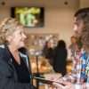 Customer engaging with a retail employee
