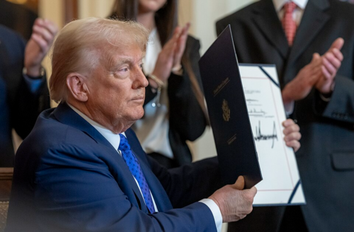 Aunt-Sandy-Moriarty-300x300 Donald Trump holding up a signed executive order for the Laken Riley Act in 2025, meant to represent Trump signing an executive order on cannabis rescheduling